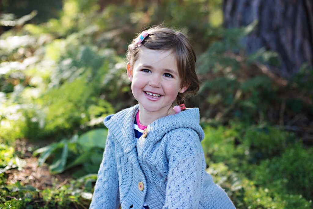 Portrait of little girl outdoors rushmere park