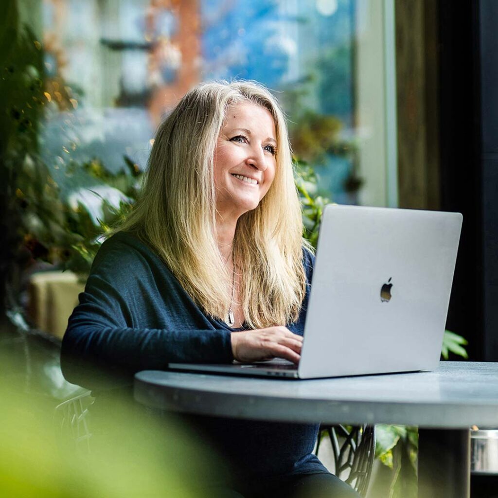 A photo of Siobhan Murphy at her laptop